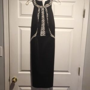 Dressy Black sleeveless Dress with white daisies